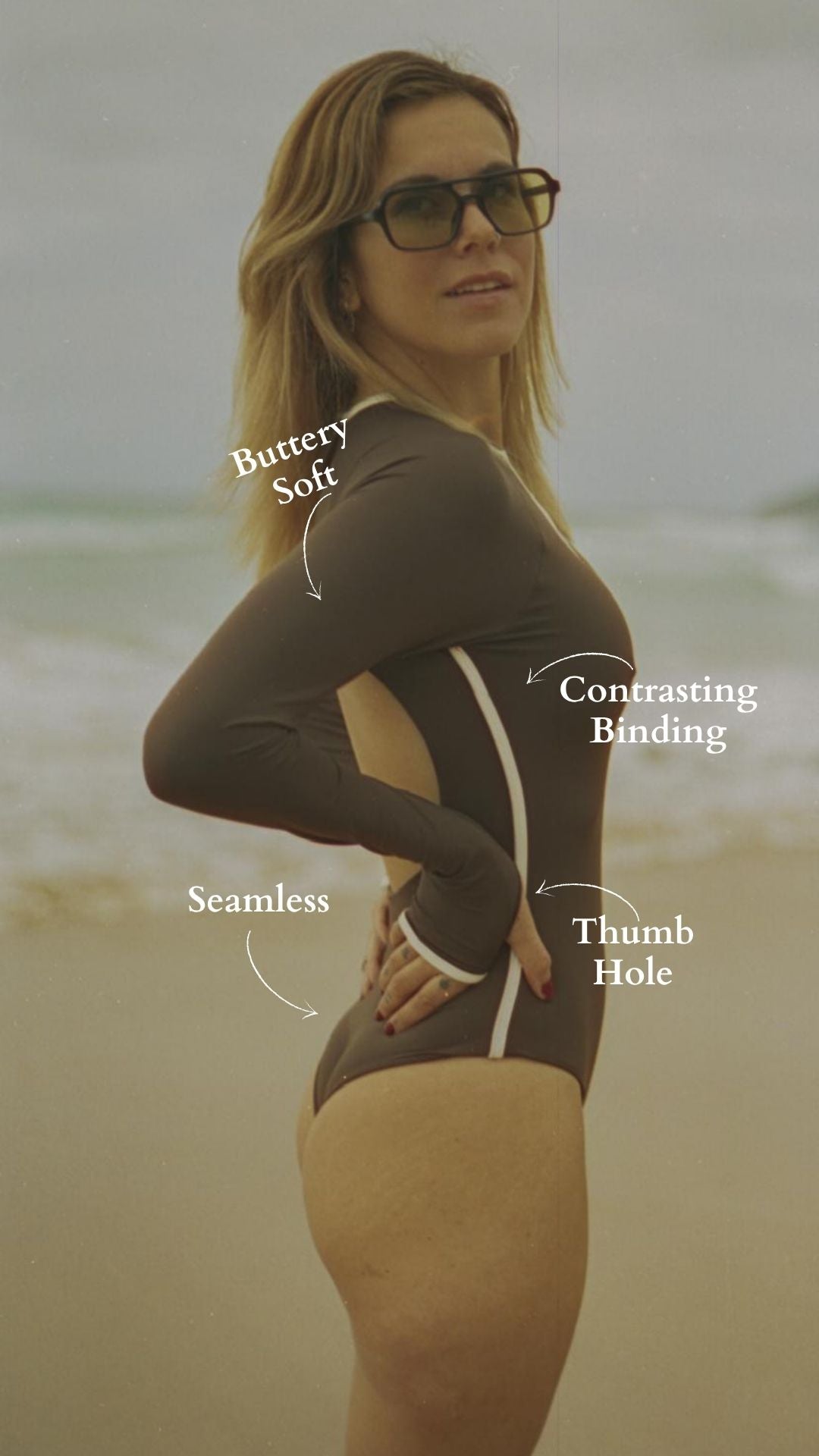 Woman wearing Trend Ripple sustainable long sleeve swimsuit with thumb hole